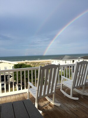 Top deck is half covered to sunbath or enjoy rain and storms w  beautiful views