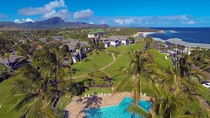 Overview of Poipu Grounds with wide greenbelts and pool