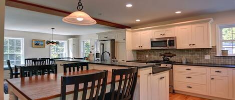 Spacious kitchen with breakfast nook.