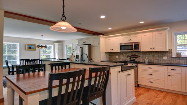 Spacious kitchen with breakfast nook.