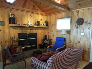 Living Room with Wood Burning Fireplace