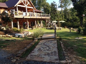 Take this path to your rental.  Enter the right hand sliding door on the patio.
