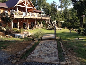 Take this path to your rental.  Enter the right hand sliding door on the patio.
