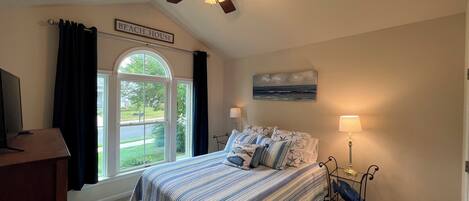 Bedroom is located in the front of the house just off the foyer and offers a Queen bed