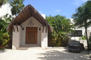 Main entrance and 4 passanger golf cart