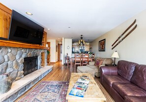 Great room with Queen size pull-out couch and twin pull-out chair.