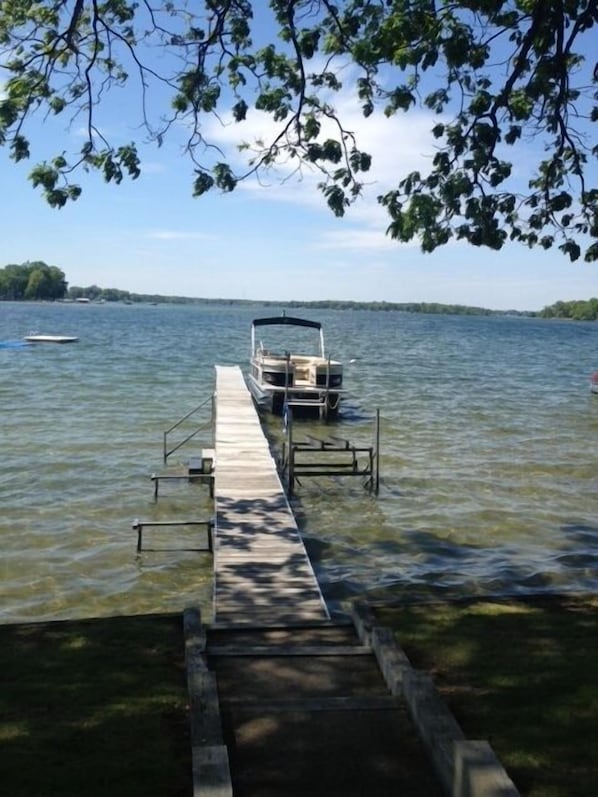 Lake front view out the front door! 15 steps from the water.