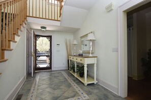 front entrance foyer with an immediate view of our dock and water.