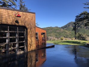 This cottage has an industrial-modern beach-western flare