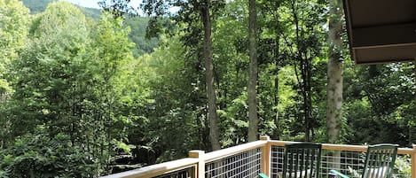 Two rocking chairs on the back deck.