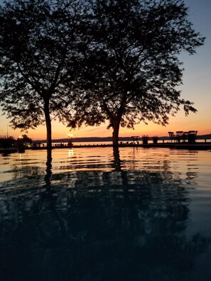 VIEW OF SUNSET FROM SWIMMING POOL