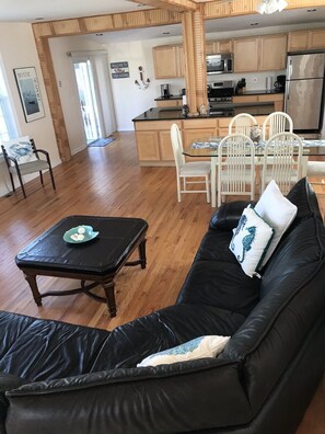 Open concept living room, dining area and kitchen 
