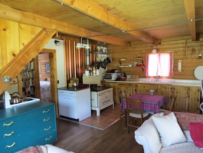 Full kitchen with both a wood and electric stove