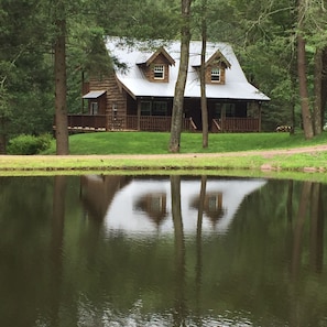 Fresh mountain spring fed pond is perfect for swimming and boating.