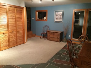 Other view of back room with laundry closet. Walk out to backyard. 