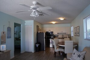 Kitchen has granite counter tops and stainless steal appliances.