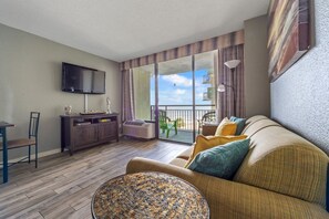 Engage in oceanview conversations from the comfort of the couch, where the living area is thoughtfully arranged to encourage socializing while savoring the sea vistas.