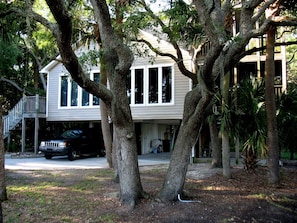 Surrounded by the oaks and palms.