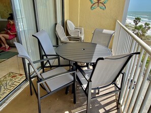  New Patio Set on Balcony with 4 chairs to enjoy Sunset Happy Hour.




