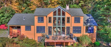 The front of the home with a deck.