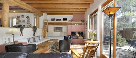 Living Room with Kiva wood burning fireplace