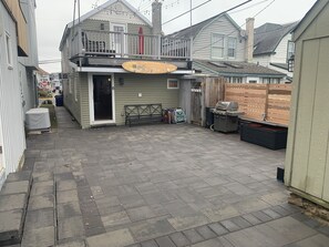 New Paver Backyard with Weber Grill and Gas Firepit