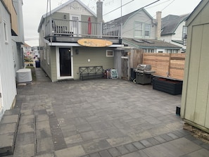 New Paver Backyard with Weber Grill and Gas Firepit