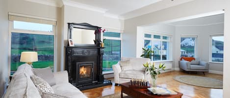 Large lounge looking out onto countryside.