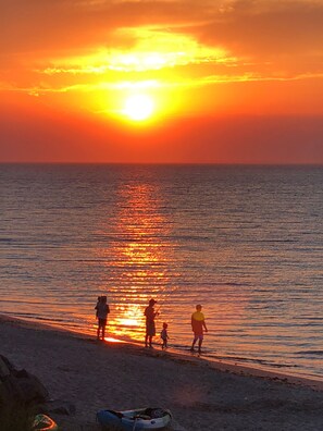 typical summer sunset as seen from your private beach 2 blocks from the house.
