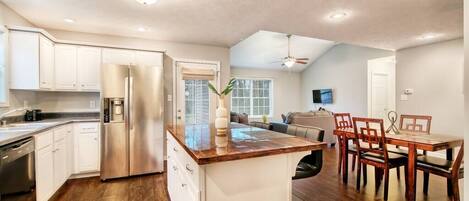 WOW! Look at this open concept! Cook and entertain your family and friends at the same time.