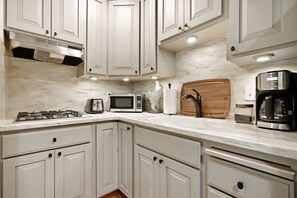 A fully remodeled kitchen is ready for cooking, coffee, and much more