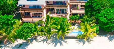 Bayside Villas next door to Las Rocas.  The Best location on West Bay Beach!!