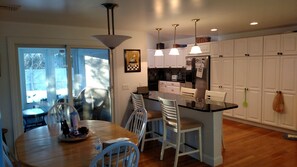 Dining area, sliding door to 3 season porch