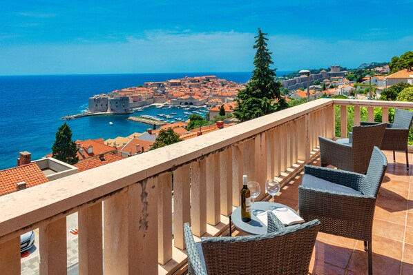 Balcony: panoramic view of Old Town, Adriatic Sea and island of Lokrum.  