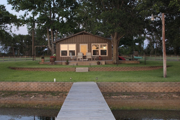 Lake Side Cabin with St. Augustine grass in summer