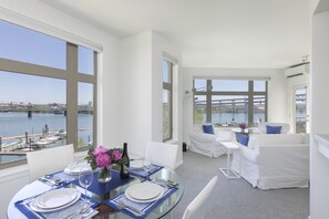 Every room in this top floor unit has an unobstructed view of the river.
