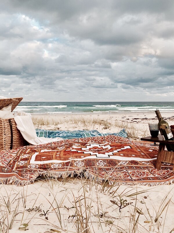 Beach picnics - picnic basket, rugs and table supplied