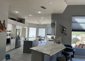 Open kitchen with breakfast bar