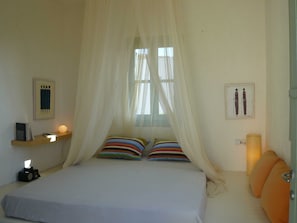 Bedroom I with mosquito net