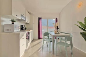 Kitchen with doors to terrace