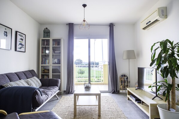 Large, bright comfortable spacious living room.