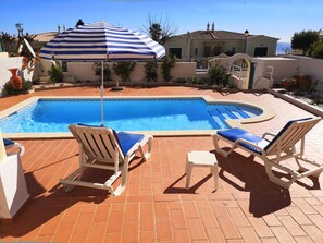 Sun beds  by the pool