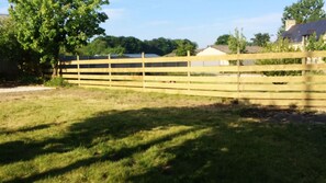 Large private fully fenced garden with BBQ and garden furniture.