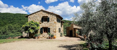 The main house with the guest house on the right