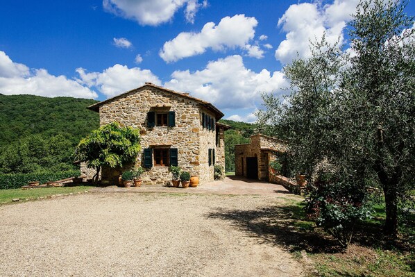 The main house with the guest house on the right