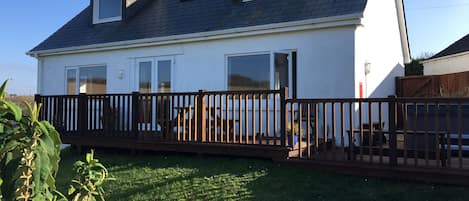 Hillside from back showing decking and hot-tub