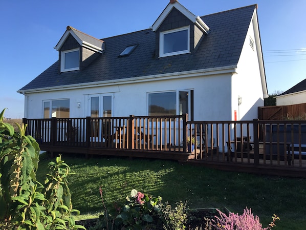 Hillside from back showing decking and hot-tub