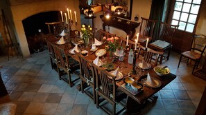 Cosy evening dining in front of the fireplace