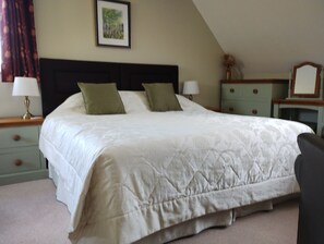 Super king size bed,can be made up as two singles when requested in advance 