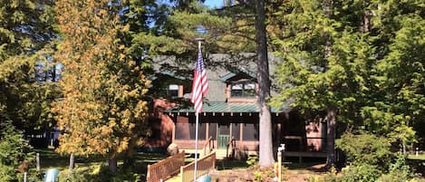 Spacious screened in porch provides an excellent view of lake.